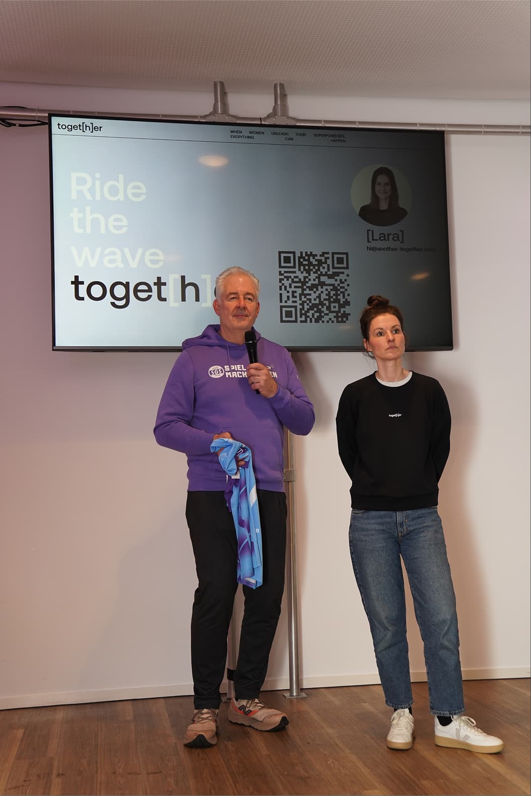 Together brand founders Lara and Frank at pitch event - female empowerment fashion entrepreneurs